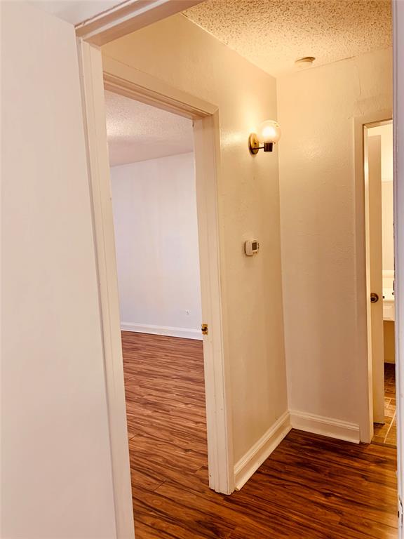 333 Melrose Drive, Unit 25A Richardson, TX 75080 - Photo 11 of 18 a view of a bathroom from the hallway