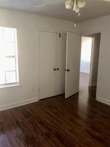 a view of balcony with wooden floor