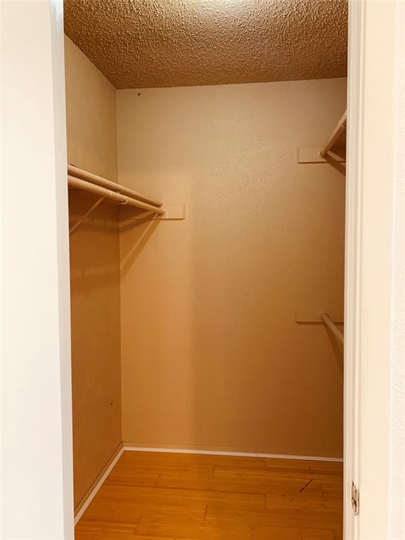 333 Melrose Drive, Unit 25A Richardson, TX 75080 - Photo 15 of 18 a view of small space with racks on the wall