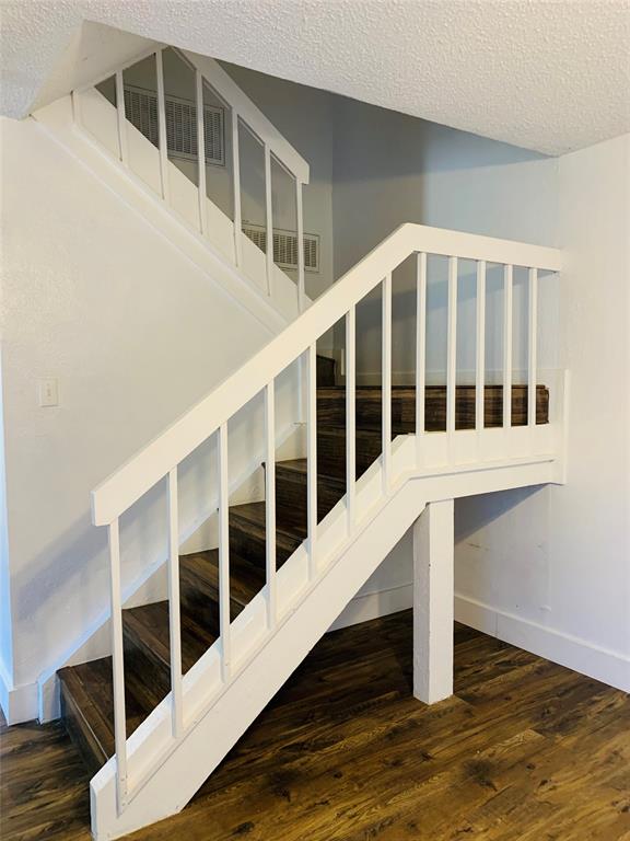 333 Melrose Drive, Unit 25A Richardson, TX 75080 - Photo 7 of 18 a large white building with glass windows