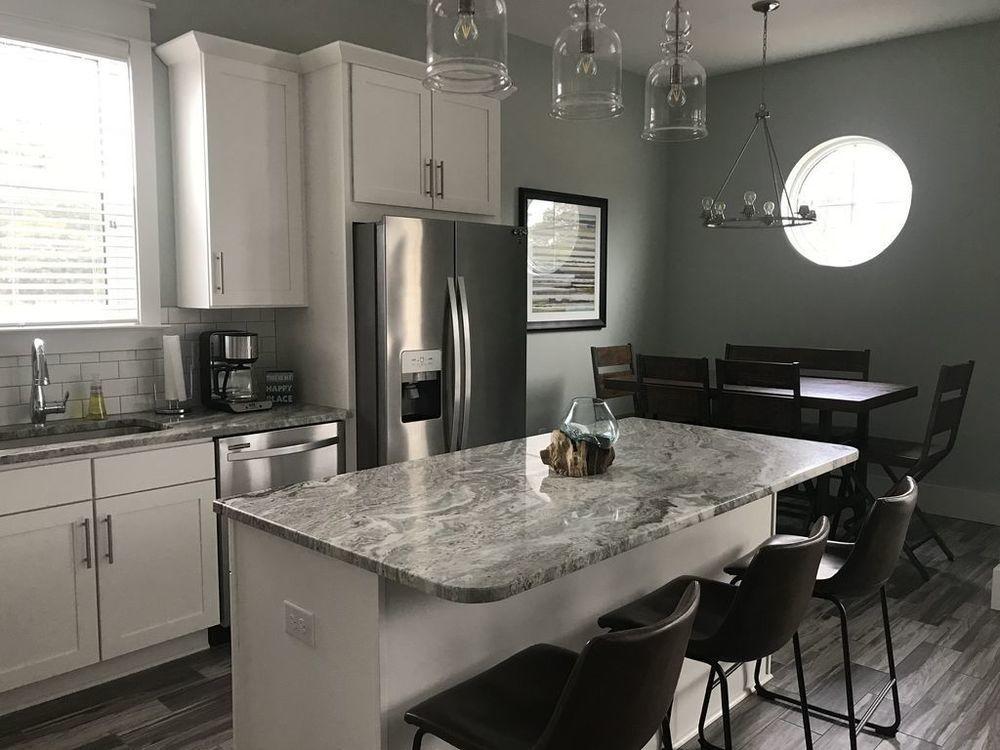 Lot 6 Valdare Ln Inlet Beach Inlet Beach, FL 32461 - Photo 6 of 23 a kitchen with stainless steel appliances granite countertop a sink a stove a refrigerator and island