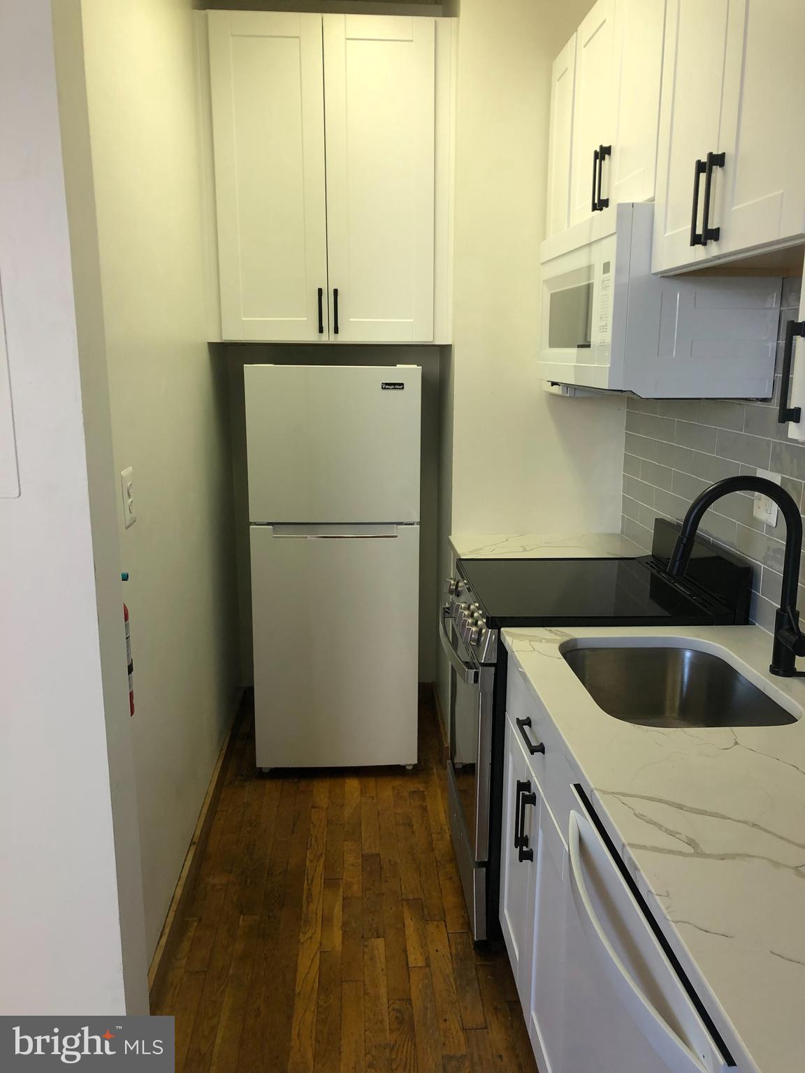 1615 Q Street Northwest, Unit 406 Washington, DC 20009 - Photo 2 of 21 Fully Renovated Kitchen