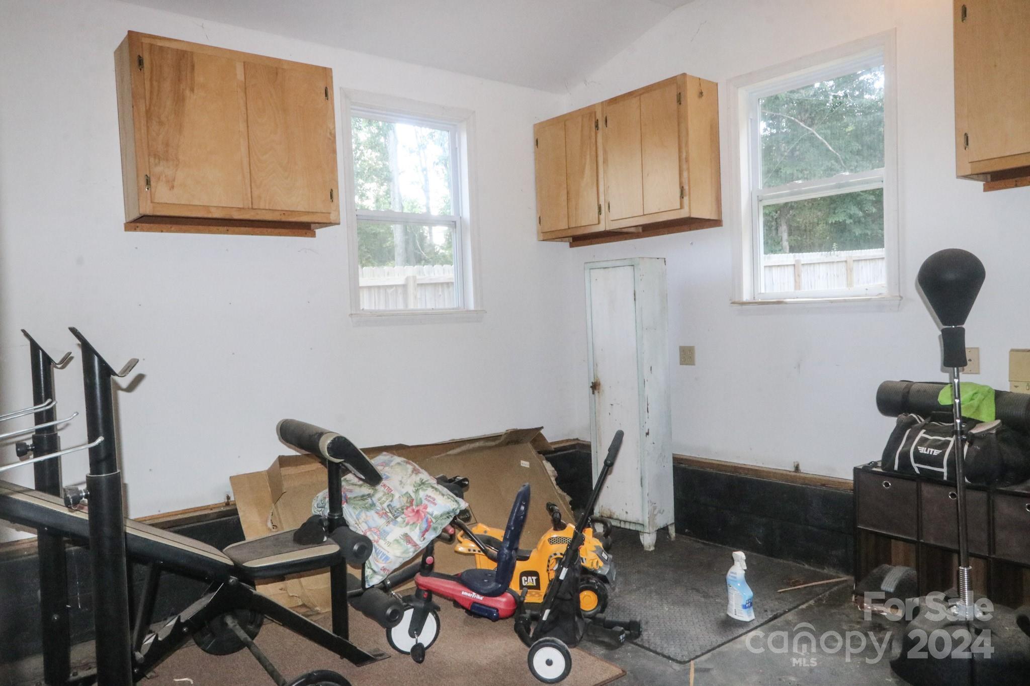 124 Maple Ridge Drive King, NC 27021 - Photo 26 of 40 a living room with furniture and a window