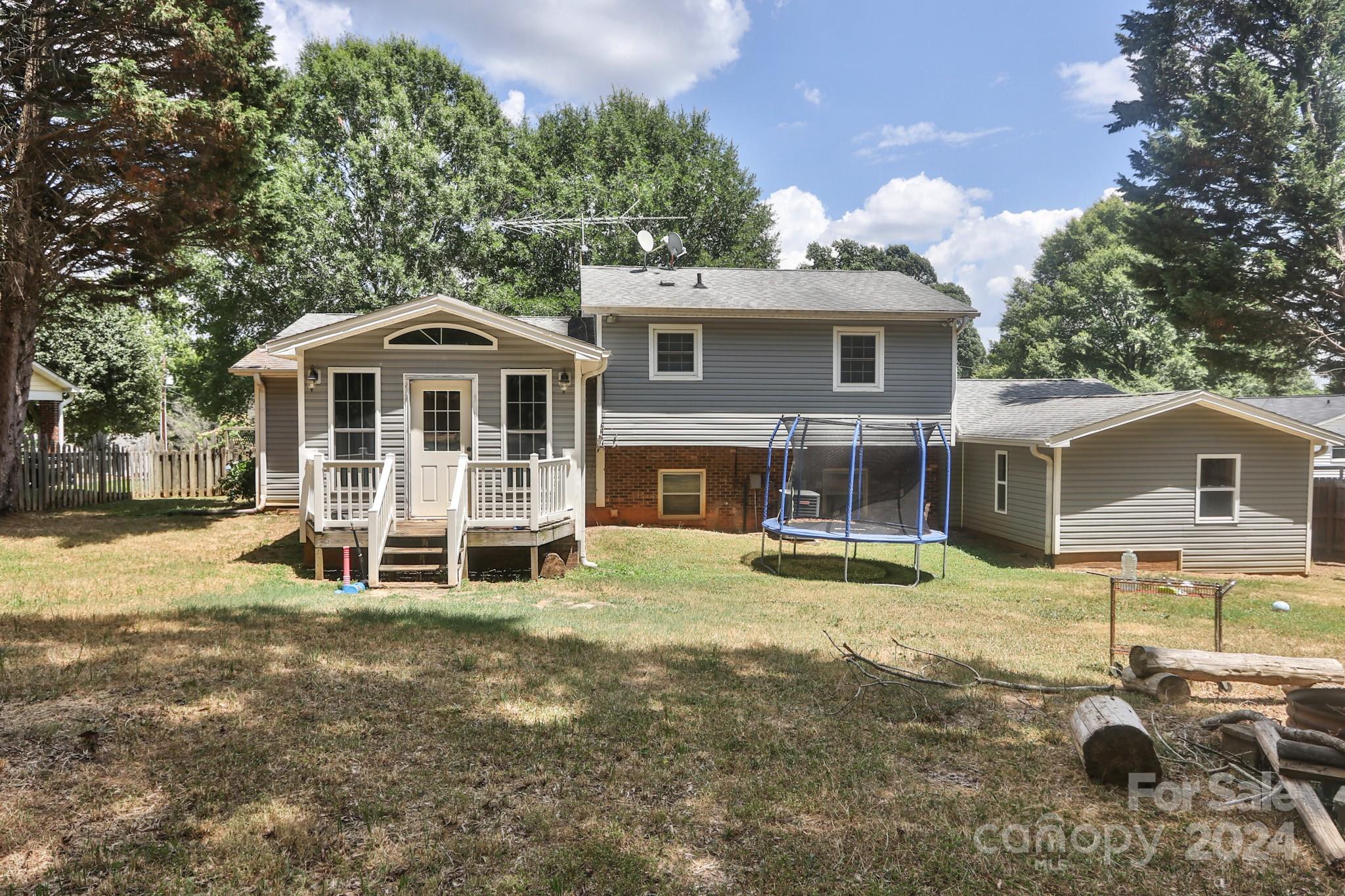 124 Maple Ridge Drive King, NC 27021 - Photo 29 of 40 a front view of a house with a yard