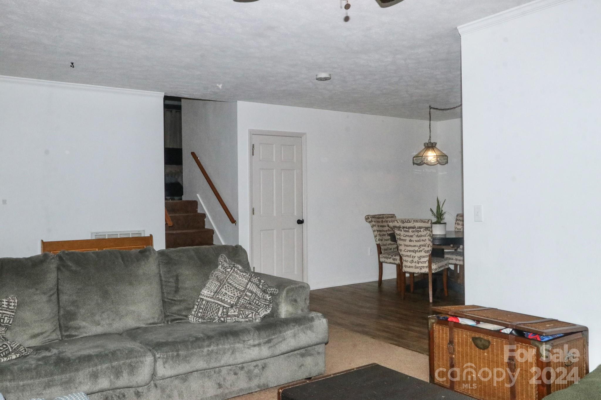 124 Maple Ridge Drive King, NC 27021 - Photo 5 of 40 a living room with furniture and wooden floor