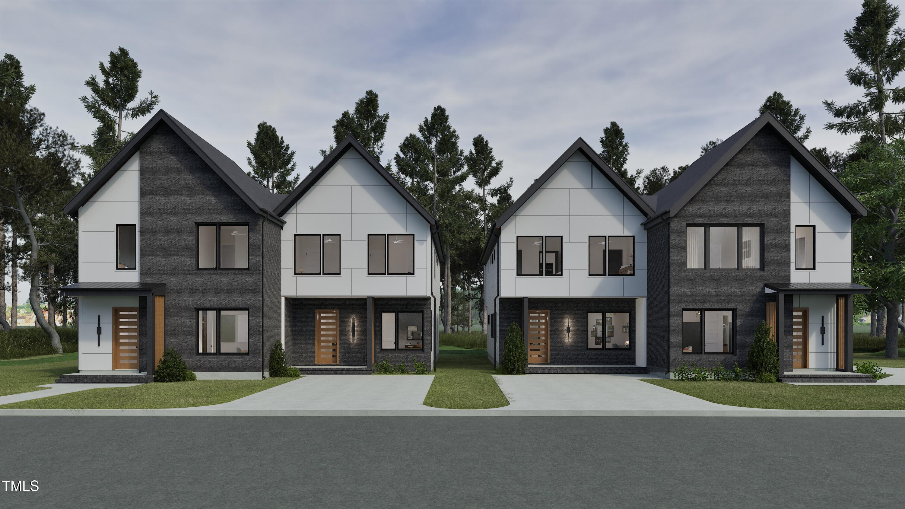 1804 Pershing Road Raleigh, NC 27608 - Photo 8 of 34 a front view of a residential apartment building with a yard