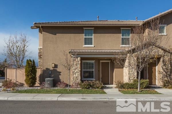 1705 Wind Ranch Road, Unit A Reno, NV 89521 - Photo 1 of 1 a front view of a house with garden