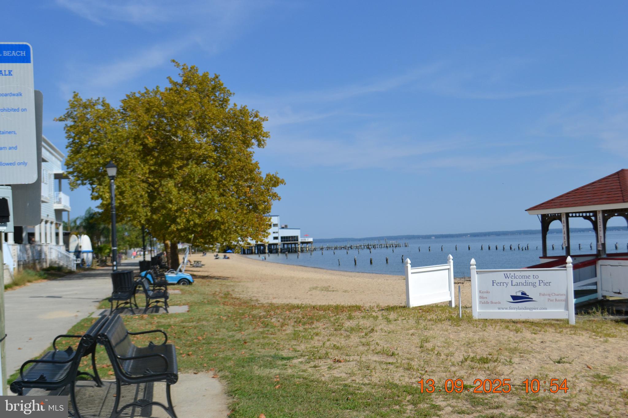 100 Taylor Street, Unit 206 Colonial Beach, VA 22443 - Photo 25 of 26 a swimming pool with outdoor seating and yard