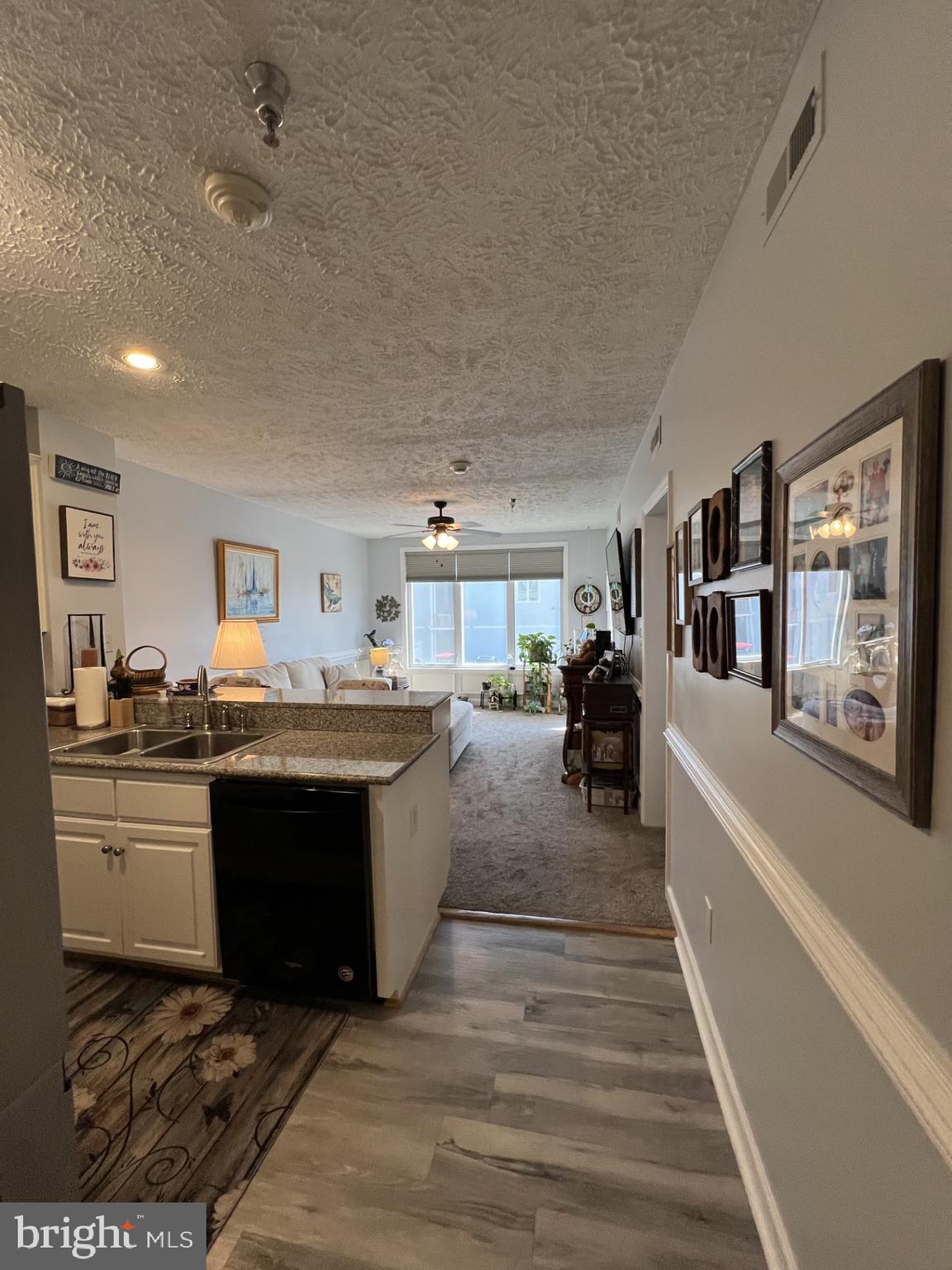 100 Taylor Street, Unit 206 Colonial Beach, VA 22443 - Photo 5 of 26 a kitchen with lots of counter top space
