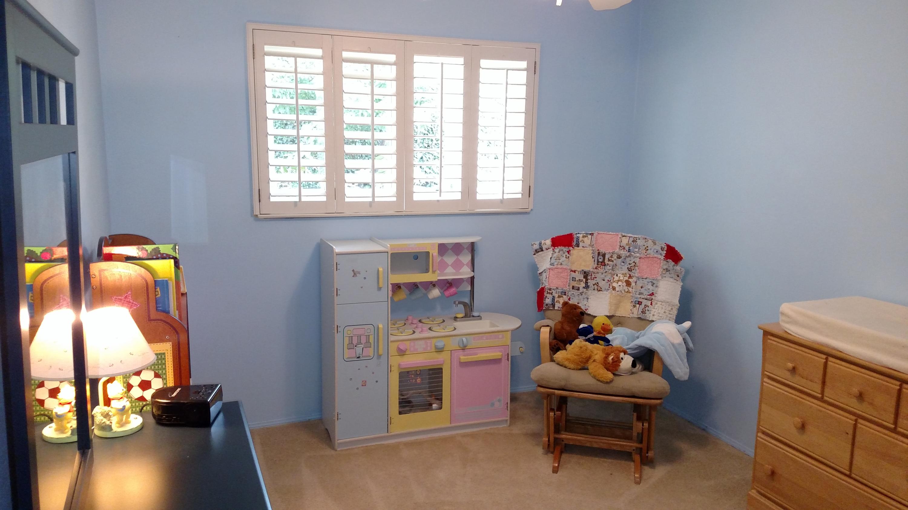 537 Windsor Avenue Goleta, CA 93117 - Photo 12 of 16 a bedroom with a bed and a mirror