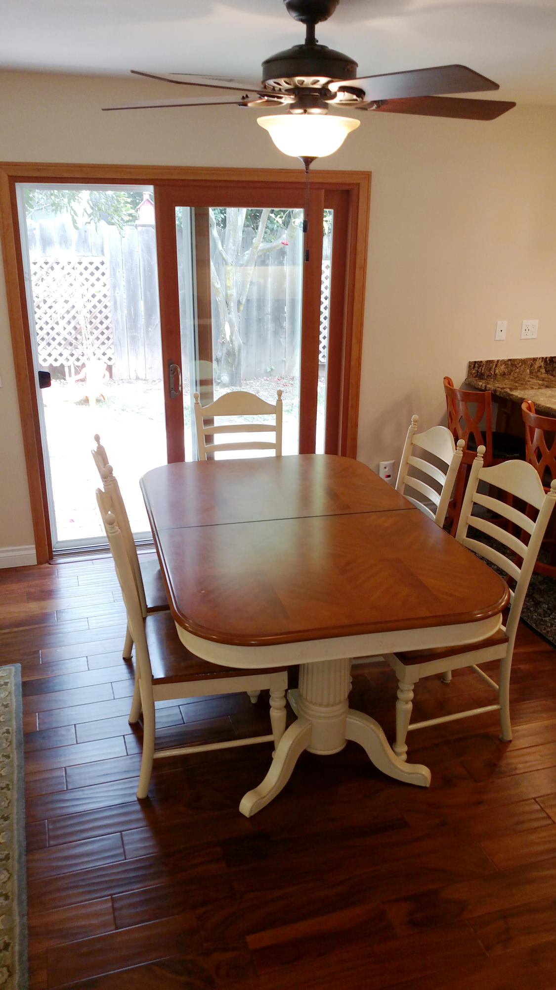537 Windsor Avenue Goleta, CA 93117 - Photo 6 of 16 a view of a dining room with furniture wooden floor and chandelier