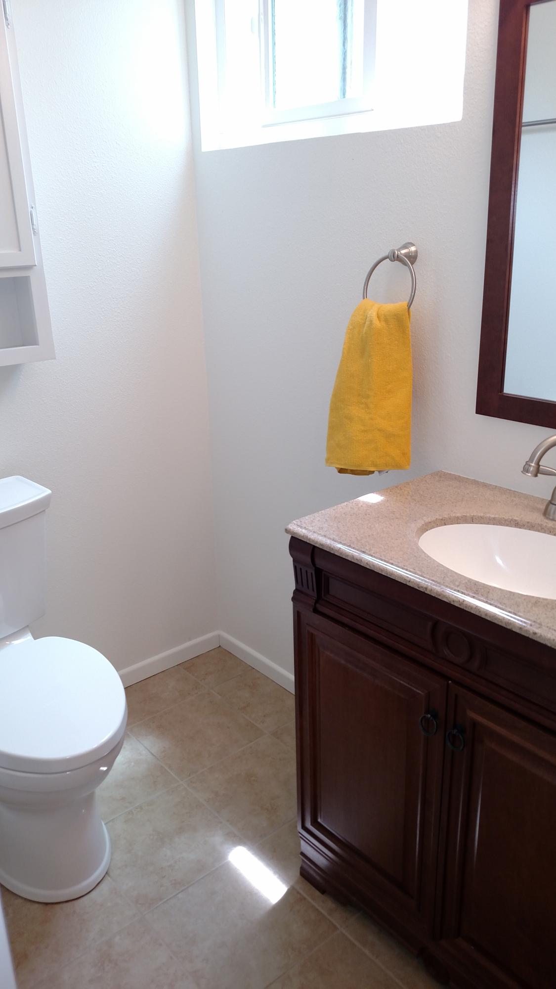 537 Windsor Avenue Goleta, CA 93117 - Photo 8 of 16 a bathroom with a sink and a toilet