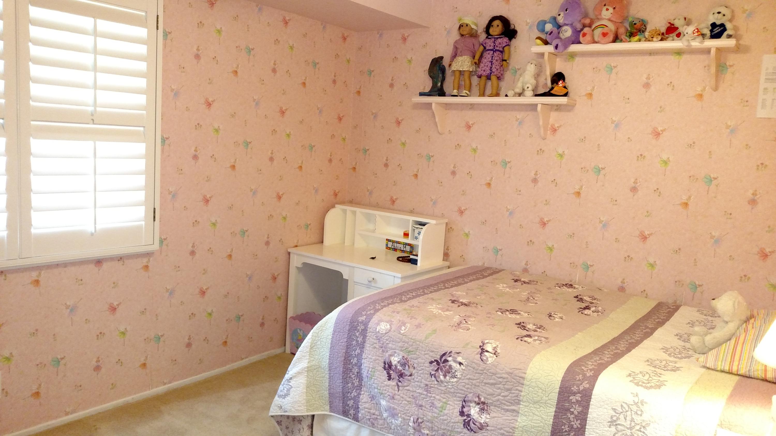 537 Windsor Avenue Goleta, CA 93117 - Photo 10 of 16 a bedroom with a bed and a window