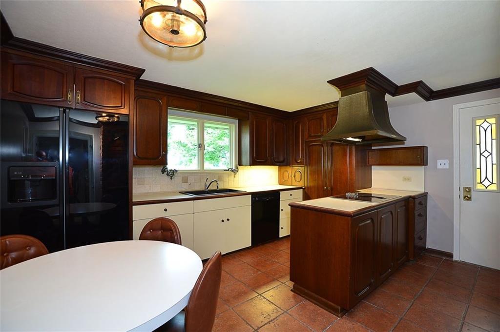 1600 Greentree Road Pittsburgh, PA 15220 - Photo 7 of 21 Large eat in kitchen with side door access and a pantry.