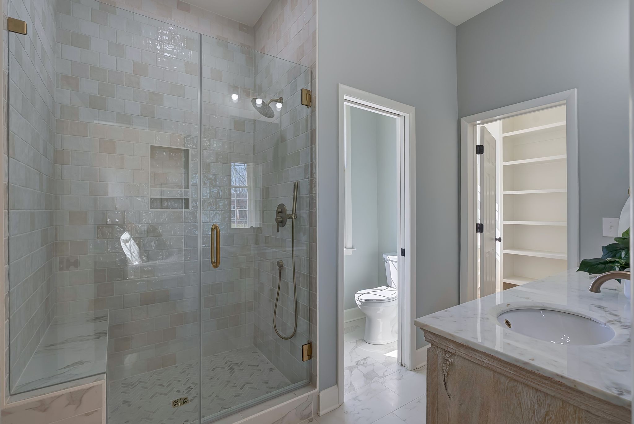 108 Poplar Street Franklin, TN 37064 - Photo 14 of 33 a bathroom with a granite countertop sink a mirror and a bathtub