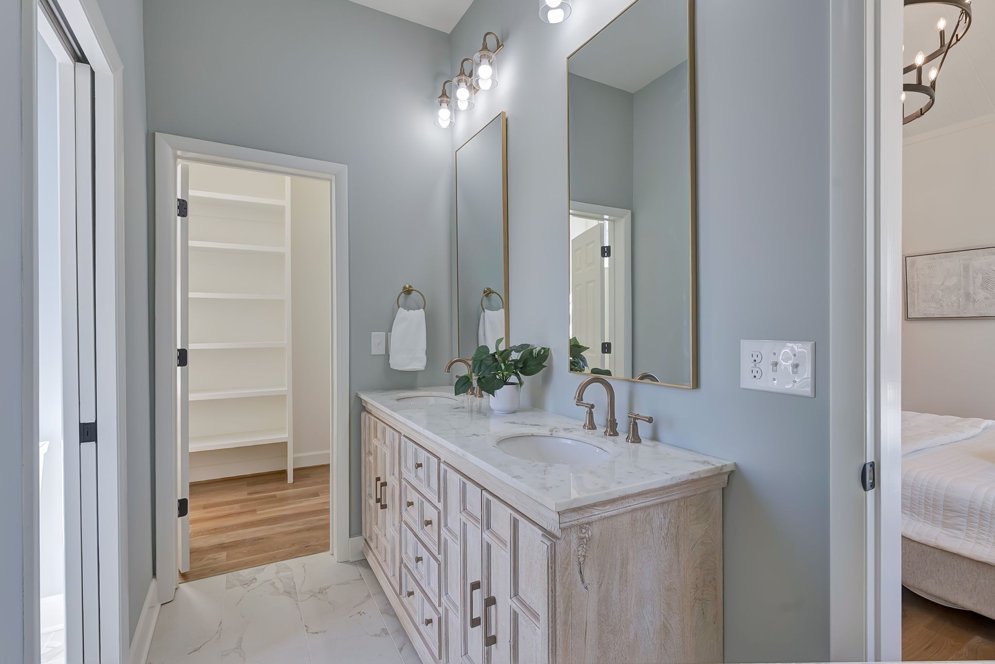 108 Poplar Street Franklin, TN 37064 - Photo 15 of 33 a bathroom with a double vanity sink and a mirror