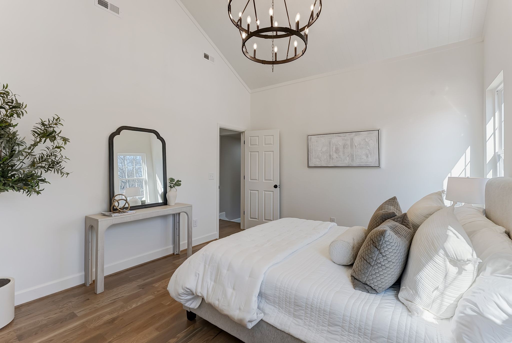 108 Poplar Street Franklin, TN 37064 - Photo 16 of 33 a bedroom with a bed and a dresser