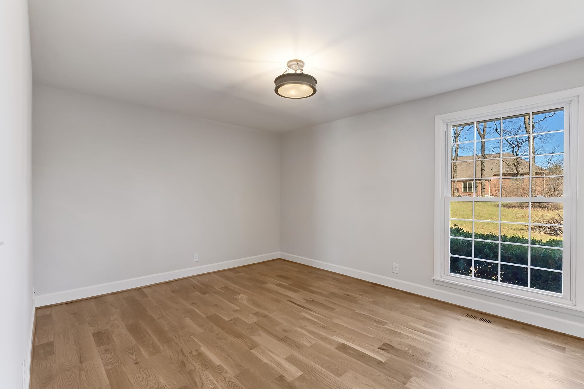 108 Poplar Street Franklin, TN 37064 - Photo 19 of 33 a view of empty room with wooden floor