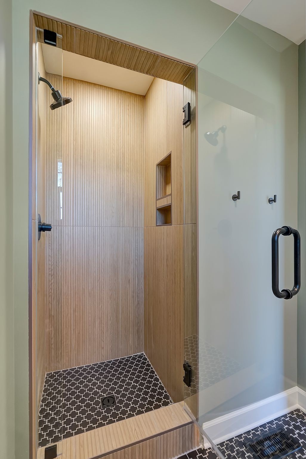 108 Poplar Street Franklin, TN 37064 - Photo 21 of 33 a bathroom with a glass shower door