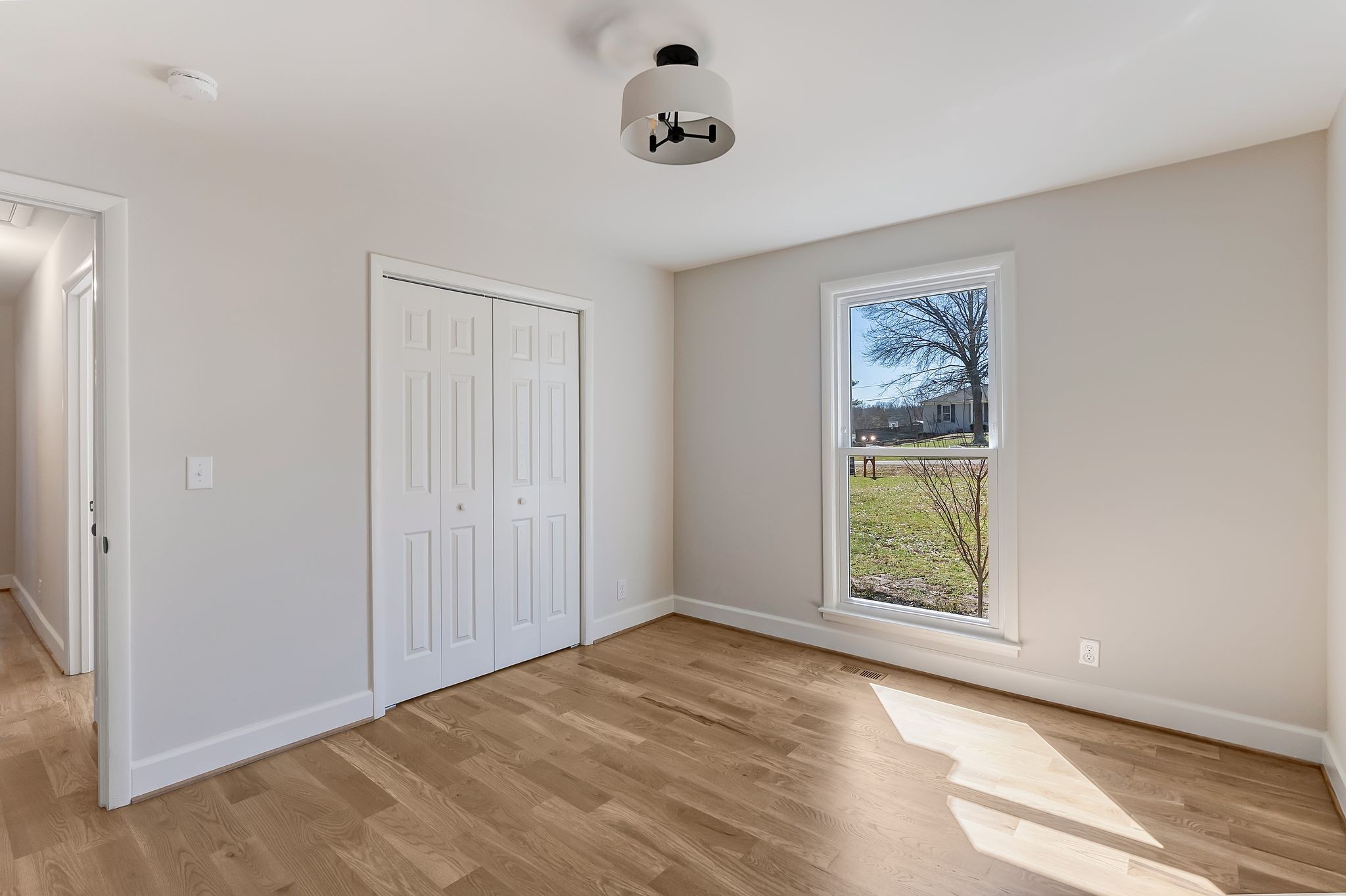 108 Poplar Street Franklin, TN 37064 - Photo 24 of 33 an empty room with windows and closet