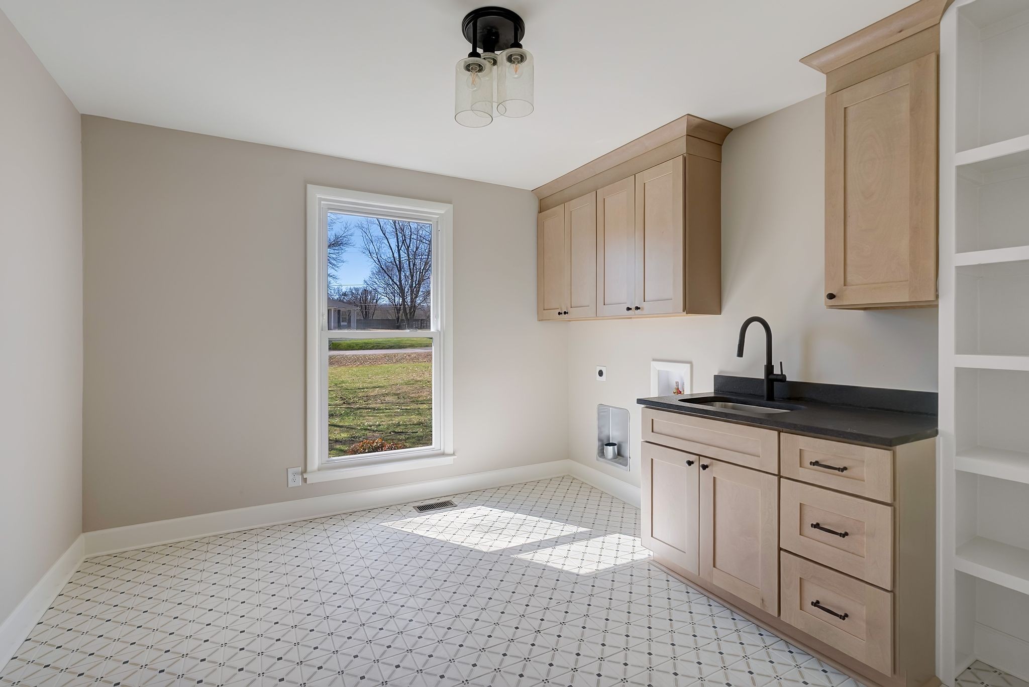 108 Poplar Street Franklin, TN 37064 - Photo 25 of 33 a kitchen with a sink cabinets and window