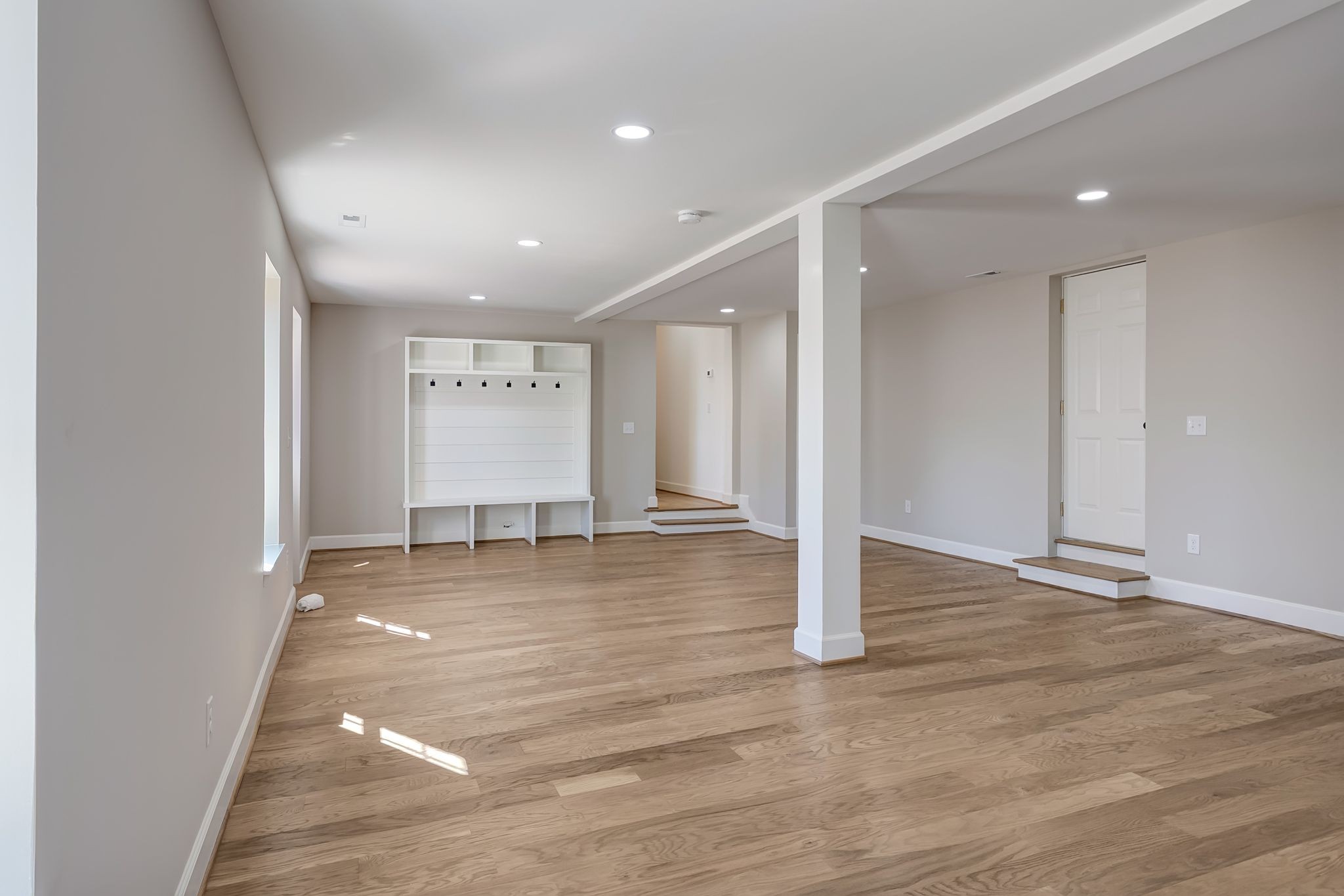 108 Poplar Street Franklin, TN 37064 - Photo 27 of 33 an empty room with wooden floor and window