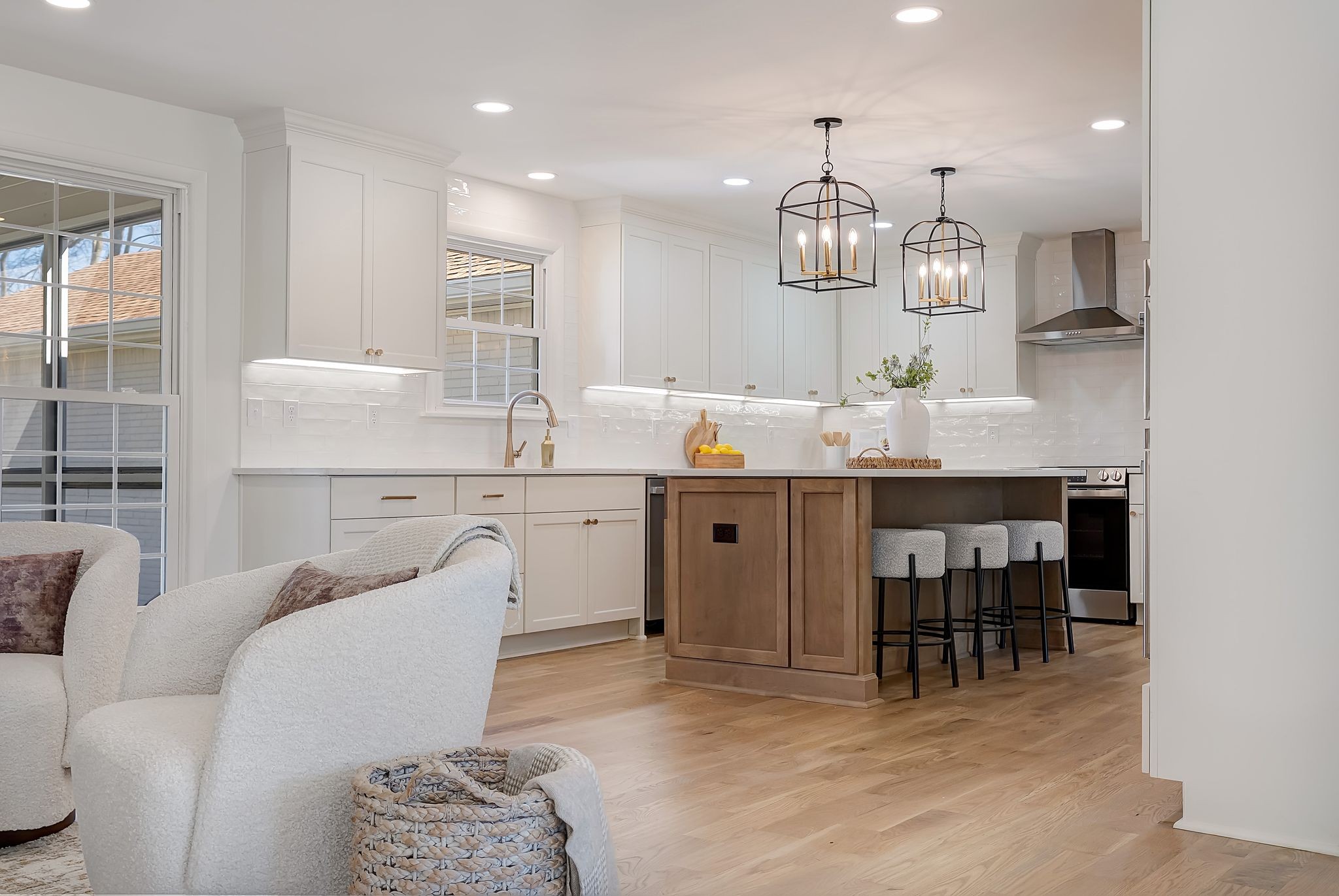 108 Poplar Street Franklin, TN 37064 - Photo 7 of 33 a kitchen with stainless steel appliances kitchen island granite countertop a sink and cabinets