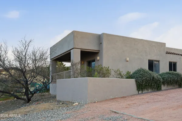 a bathroom with a sink vanity granite and toilet
