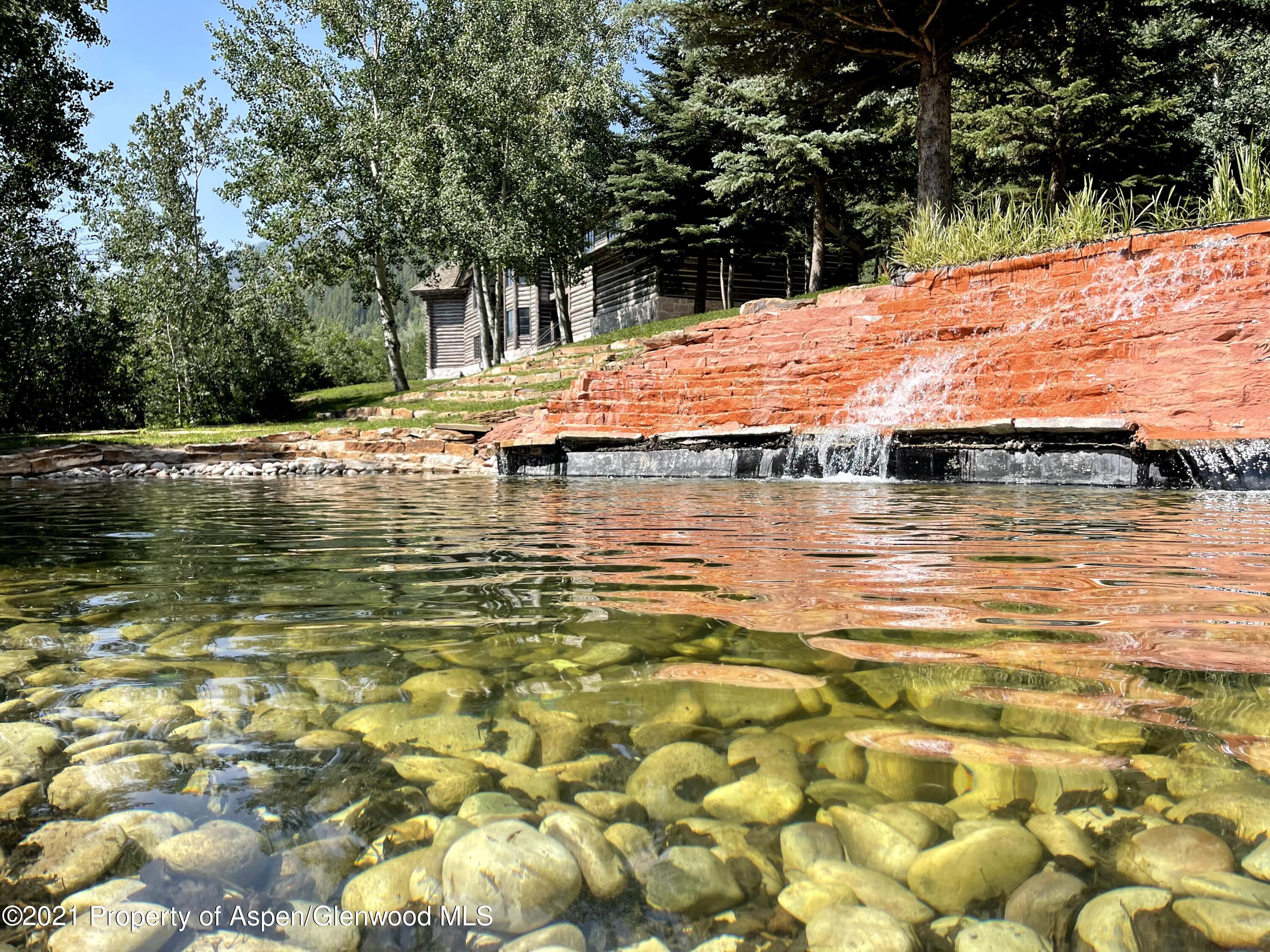 931 North Hayden Road Aspen, CO 81611 - Photo 36 of 44 a view of swimming pool with an outdoor space
