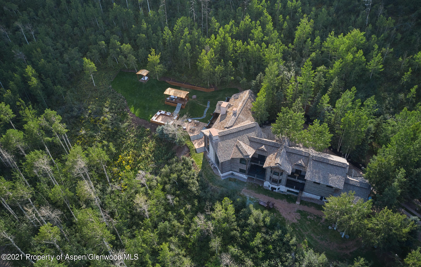 931 North Hayden Road Aspen, CO 81611 - Photo 4 of 44 an aerial view of a house with a yard