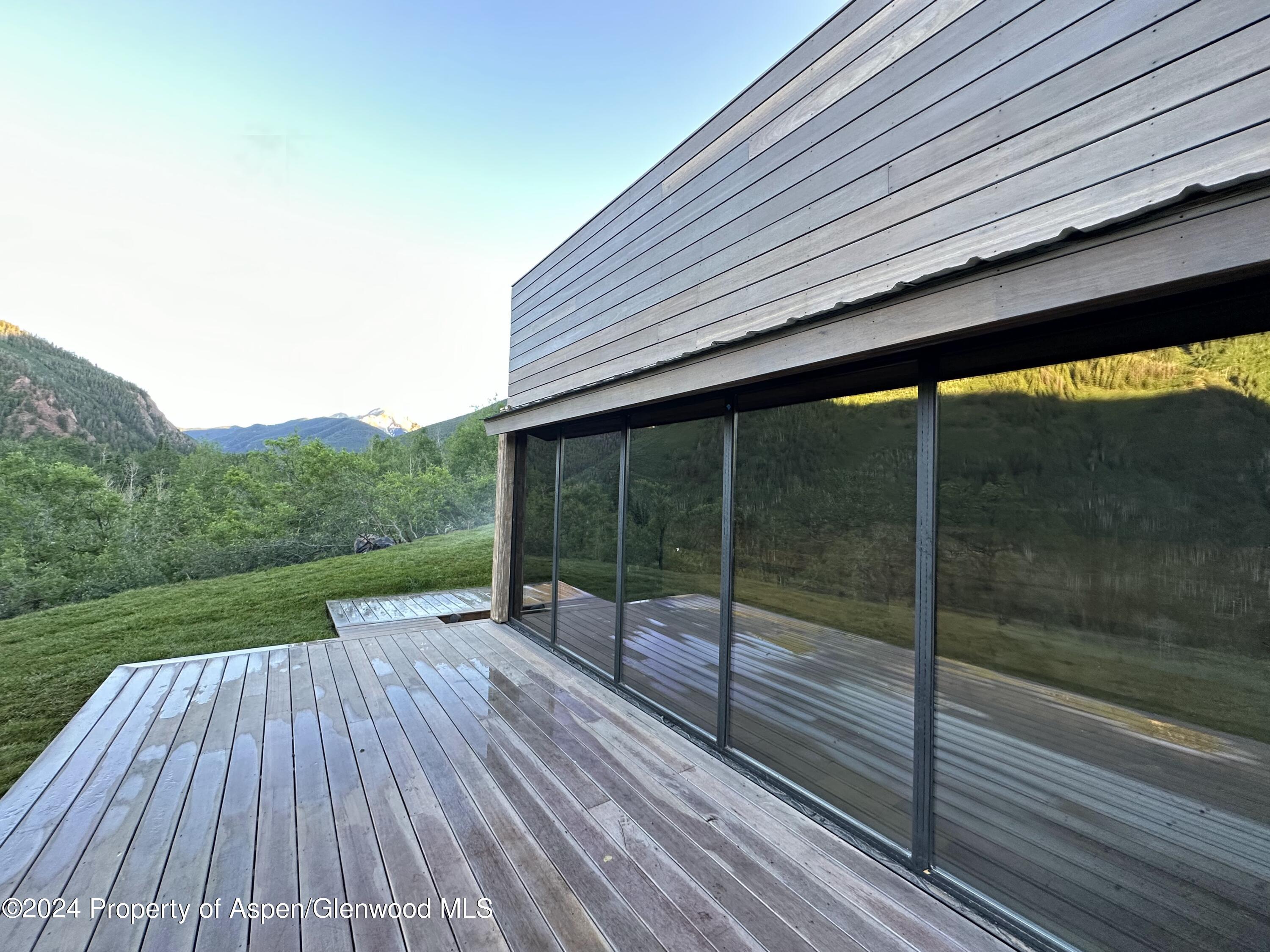 931 North Hayden Road Aspen, CO 81611 - Photo 41 of 44 a view of backyard with green space