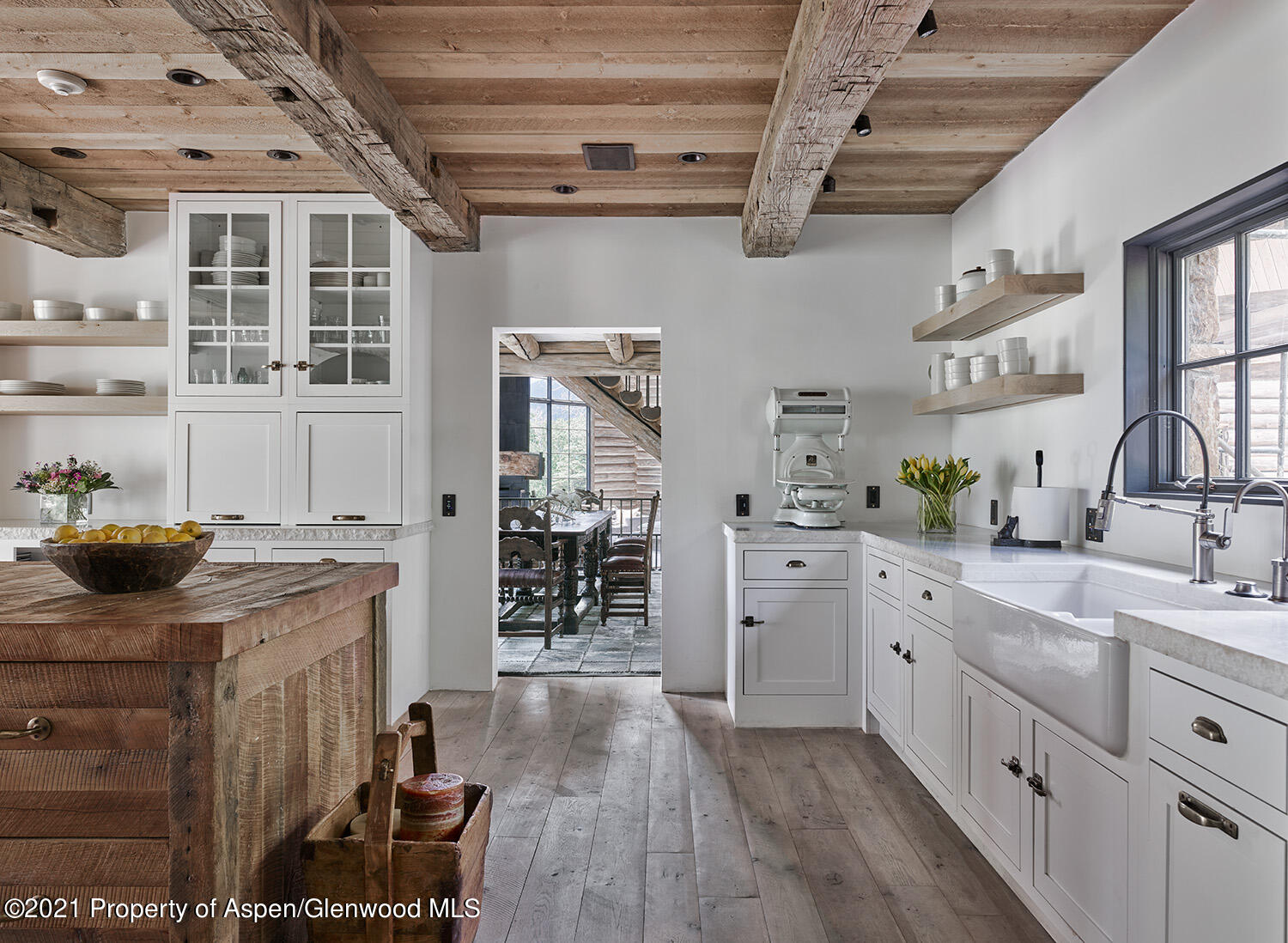931 North Hayden Road Aspen, CO 81611 - Photo 9 of 44 a kitchen with cabinets and window