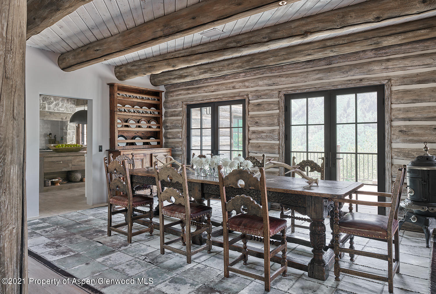 931 North Hayden Road Aspen, CO 81611 - Photo 10 of 44 a view of a dining room with furniture and window