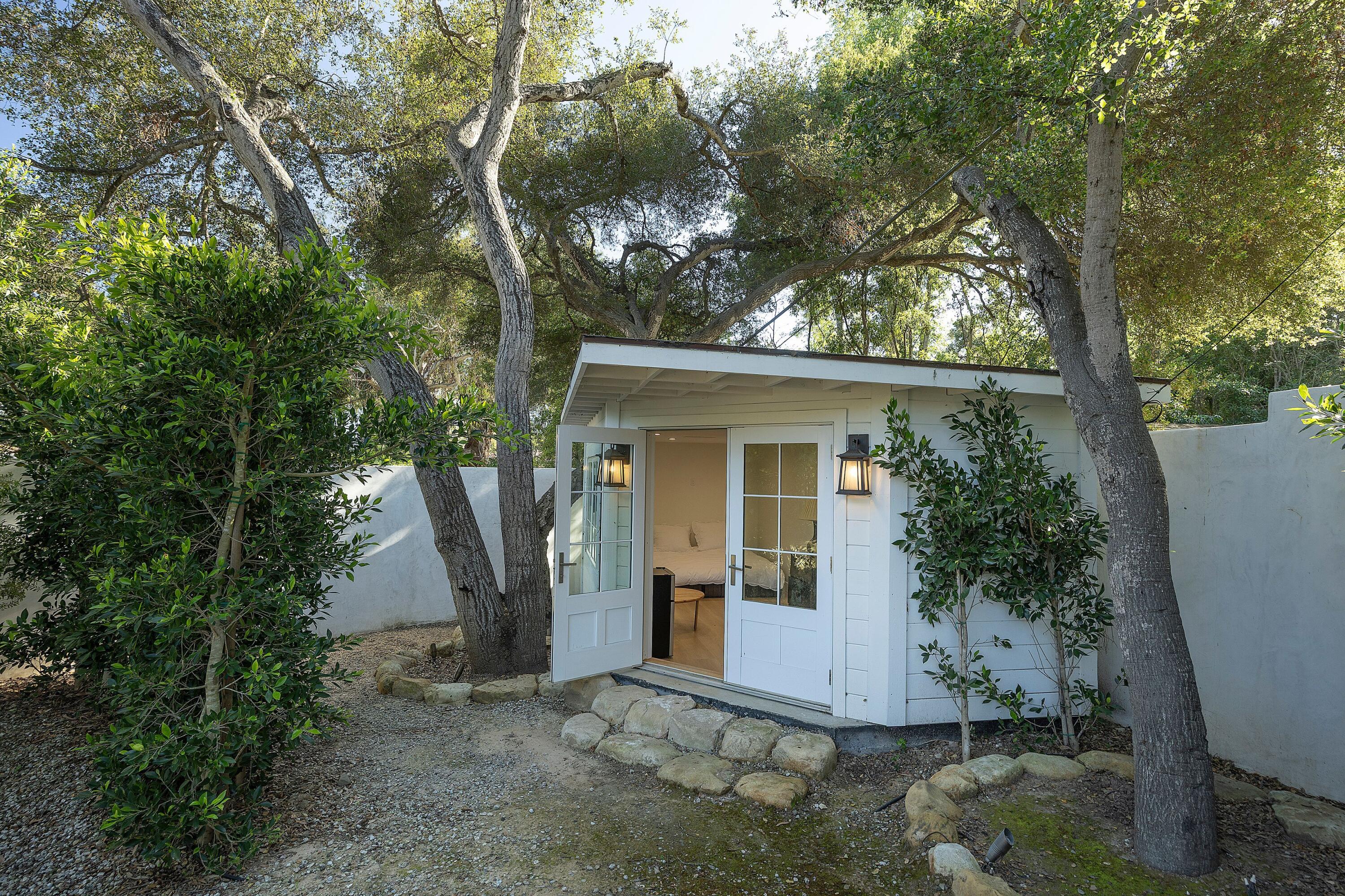 487 Hot Springs Road Santa Barbara, CA 93108 - Photo 16 of 47 a view of a house with backyard