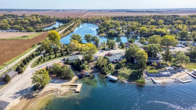 an aerial view of a house with a garden