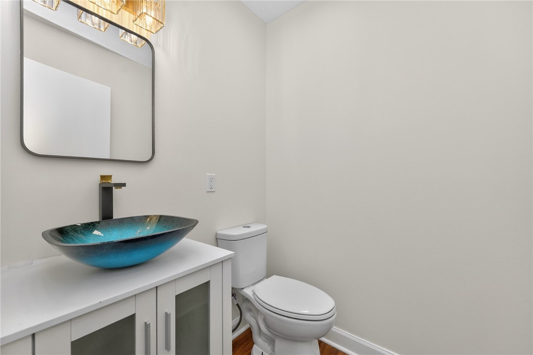 811 Wind Bluff Point Springboro, OH 45066 - Photo 15 of 51 This bathroom features a contemporary vessel sink and sleek vanity, perfect for modern living.