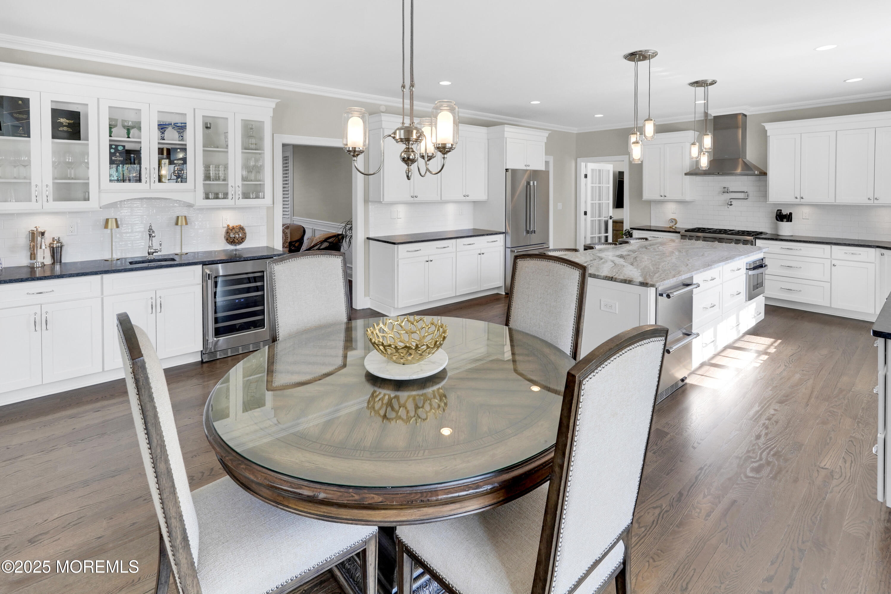 16 Winding Way Little Silver, NJ 07739 - Photo 12 of 31 a kitchen with granite countertop kitchen island stainless steel appliances a table and chairs