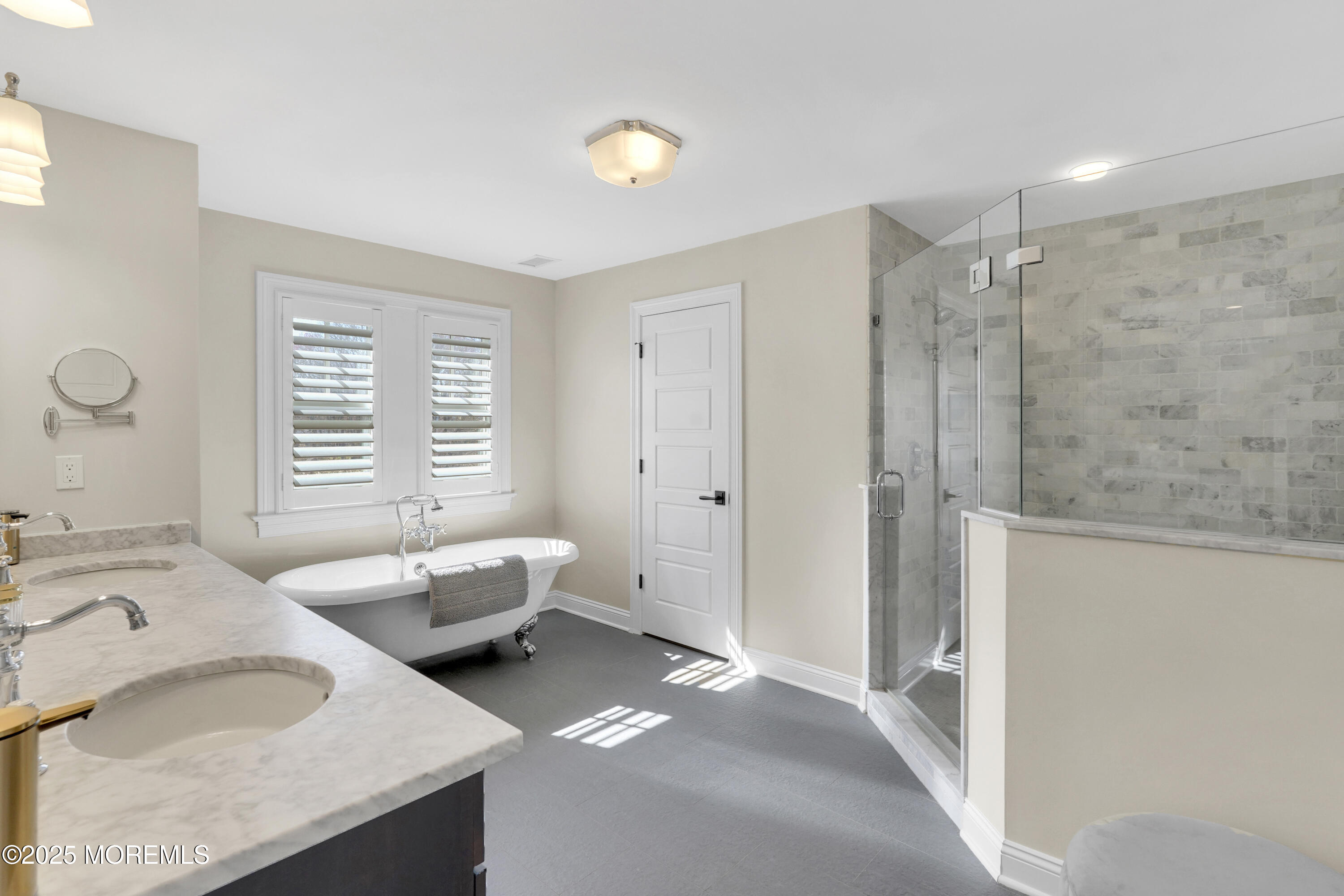 16 Winding Way Little Silver, NJ 07739 - Photo 17 of 31 a spacious bathroom with a granite countertop tub sink and mirror