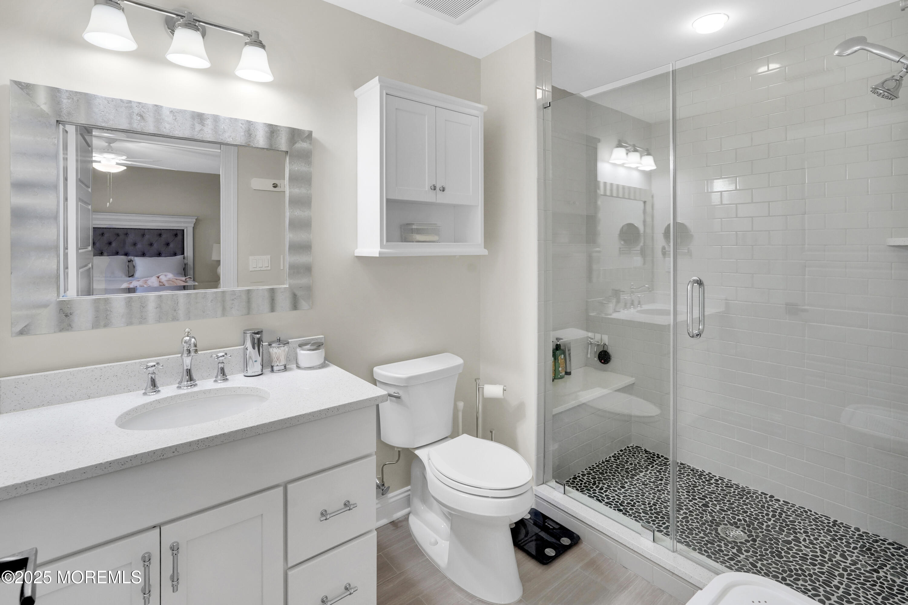 16 Winding Way Little Silver, NJ 07739 - Photo 19 of 31 a bathroom with a sink a toilet a mirror and shower