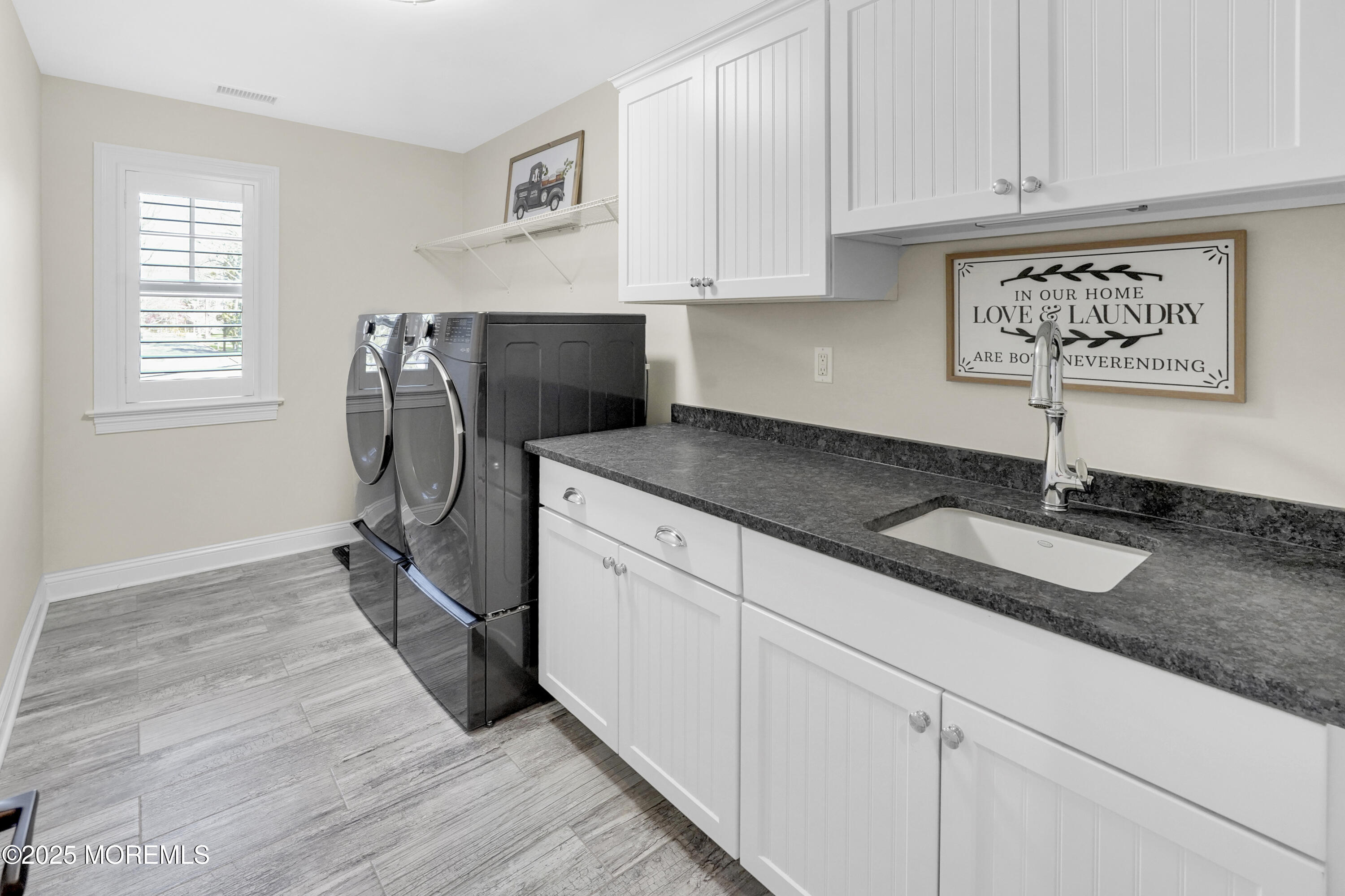 16 Winding Way Little Silver, NJ 07739 - Photo 20 of 31 a kitchen with stainless steel appliances granite countertop a sink stove and refrigerator