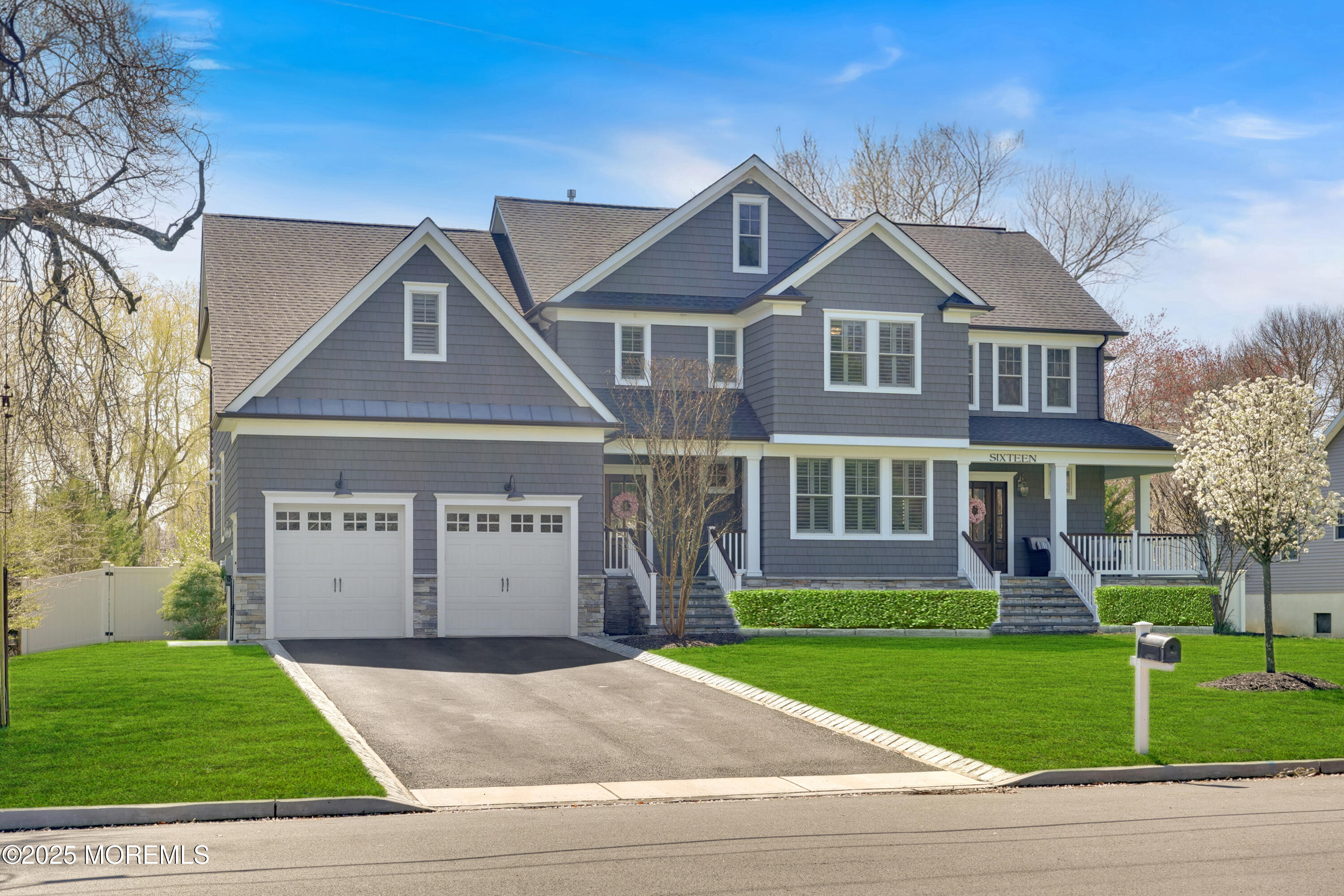 16 Winding Way Little Silver, NJ 07739 - Photo 2 of 31 a front view of a house with a yard