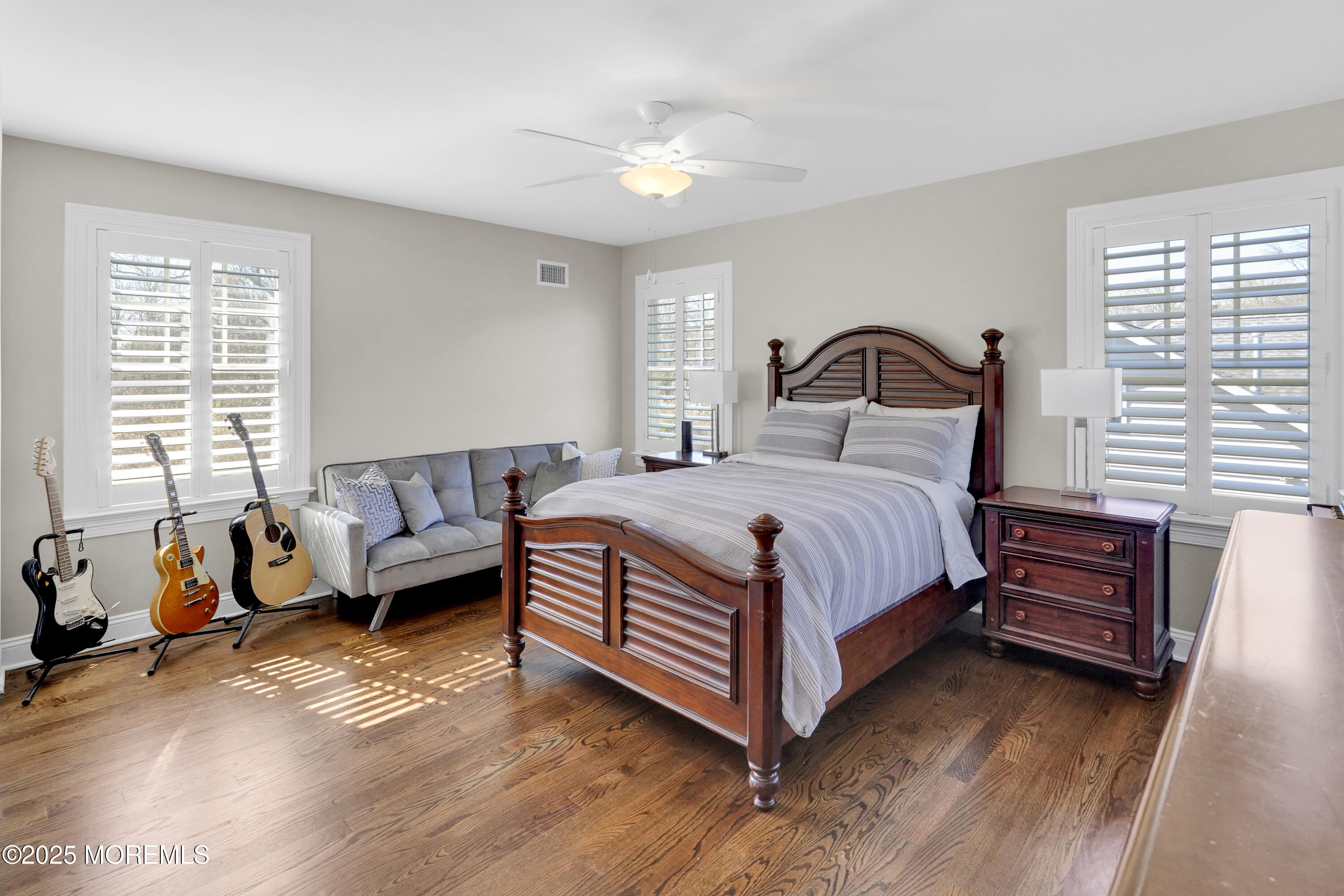 16 Winding Way Little Silver, NJ 07739 - Photo 21 of 31 a bedroom with a bed and a couch