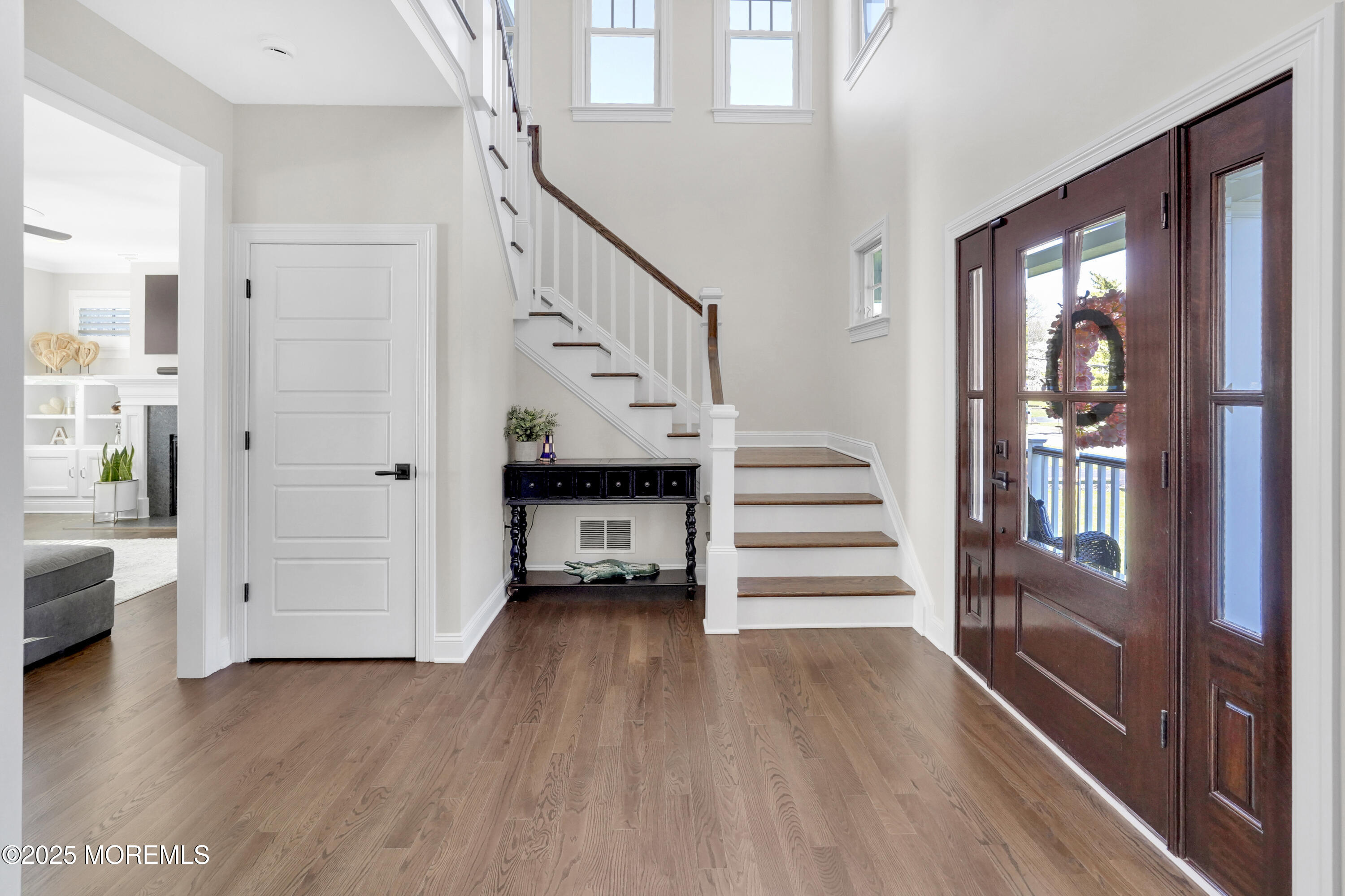 16 Winding Way Little Silver, NJ 07739 - Photo 4 of 31 a view of front door with hallway and wooden floor