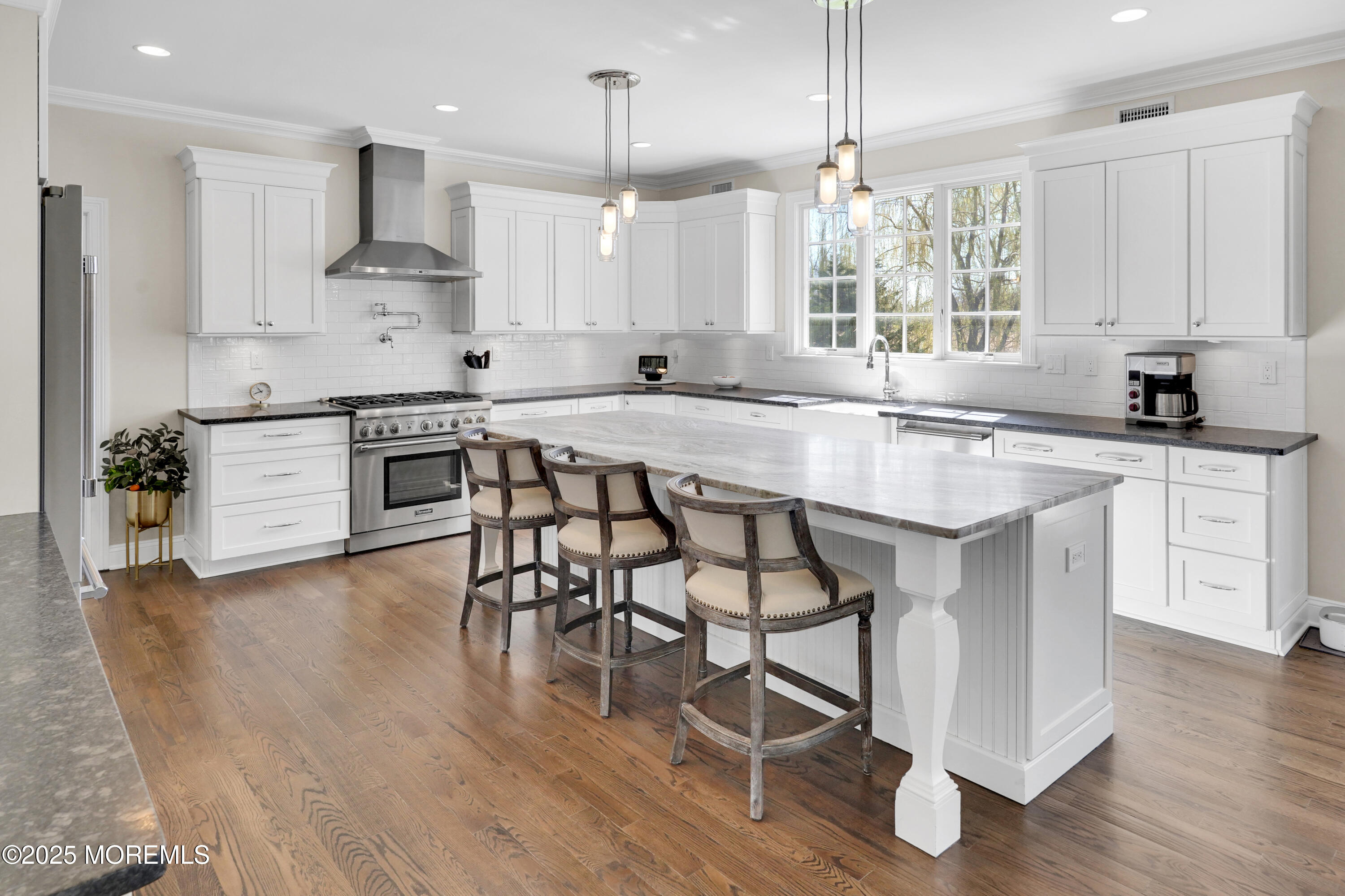 16 Winding Way Little Silver, NJ 07739 - Photo 6 of 31 a kitchen with stainless steel appliances granite countertop white cabinets and wooden floor