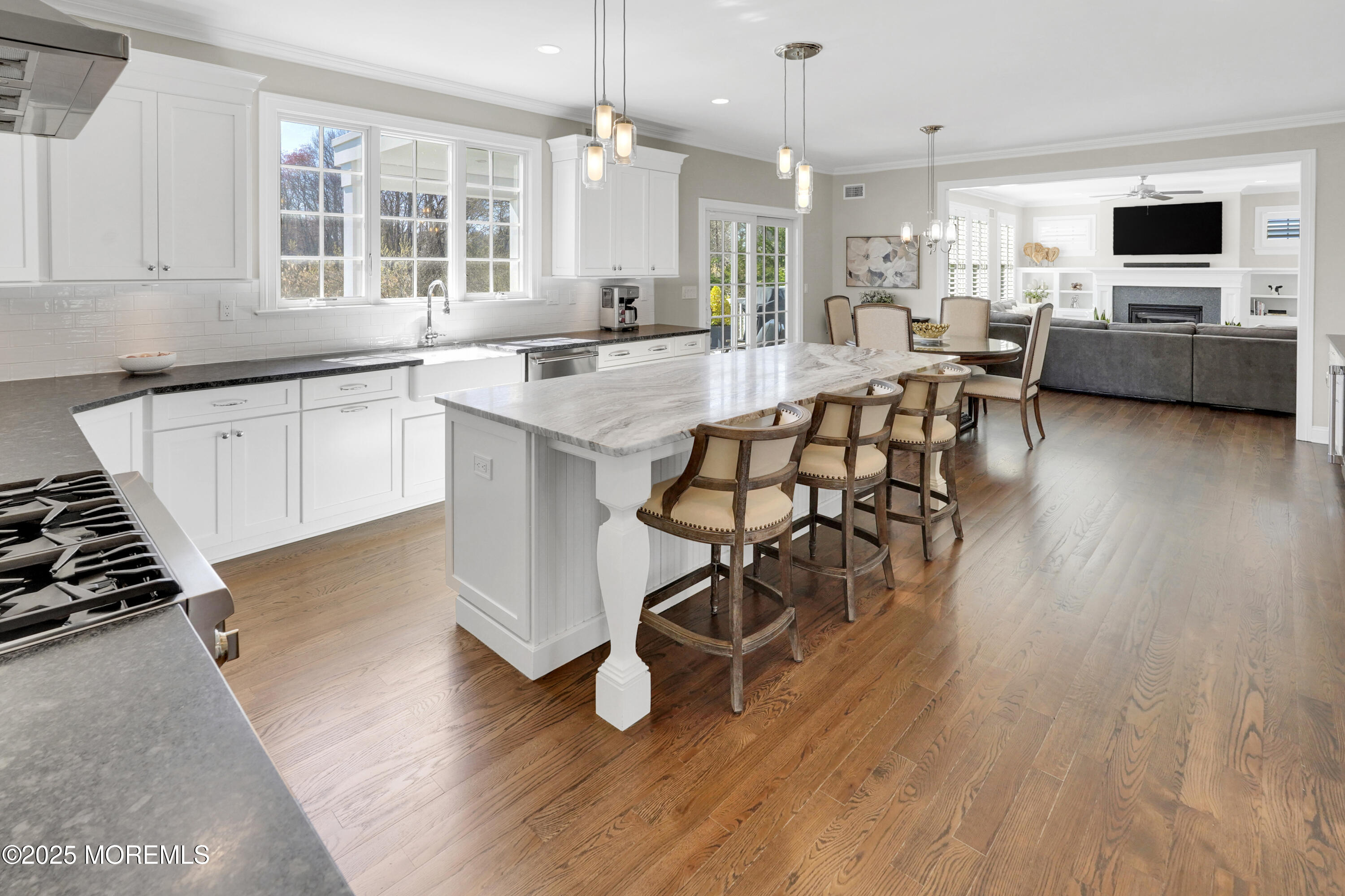 16 Winding Way Little Silver, NJ 07739 - Photo 7 of 31 a large kitchen with a table and chairs