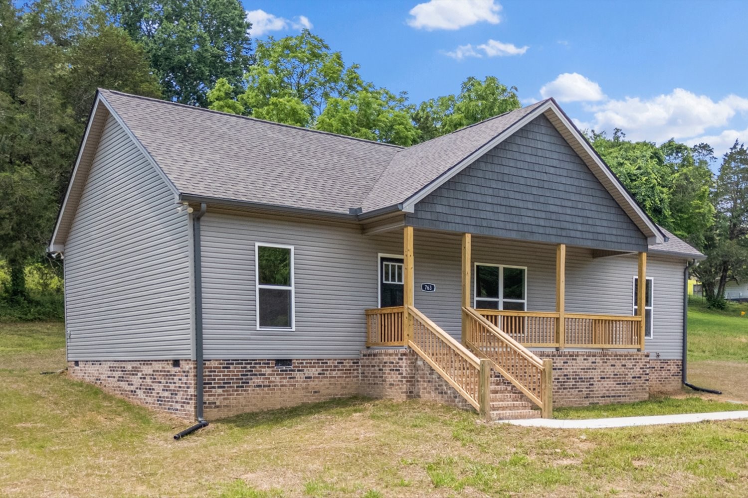 763 Potter Road Dickson, TN 37055 - Photo 2 of 23 a view of a house with backyard
