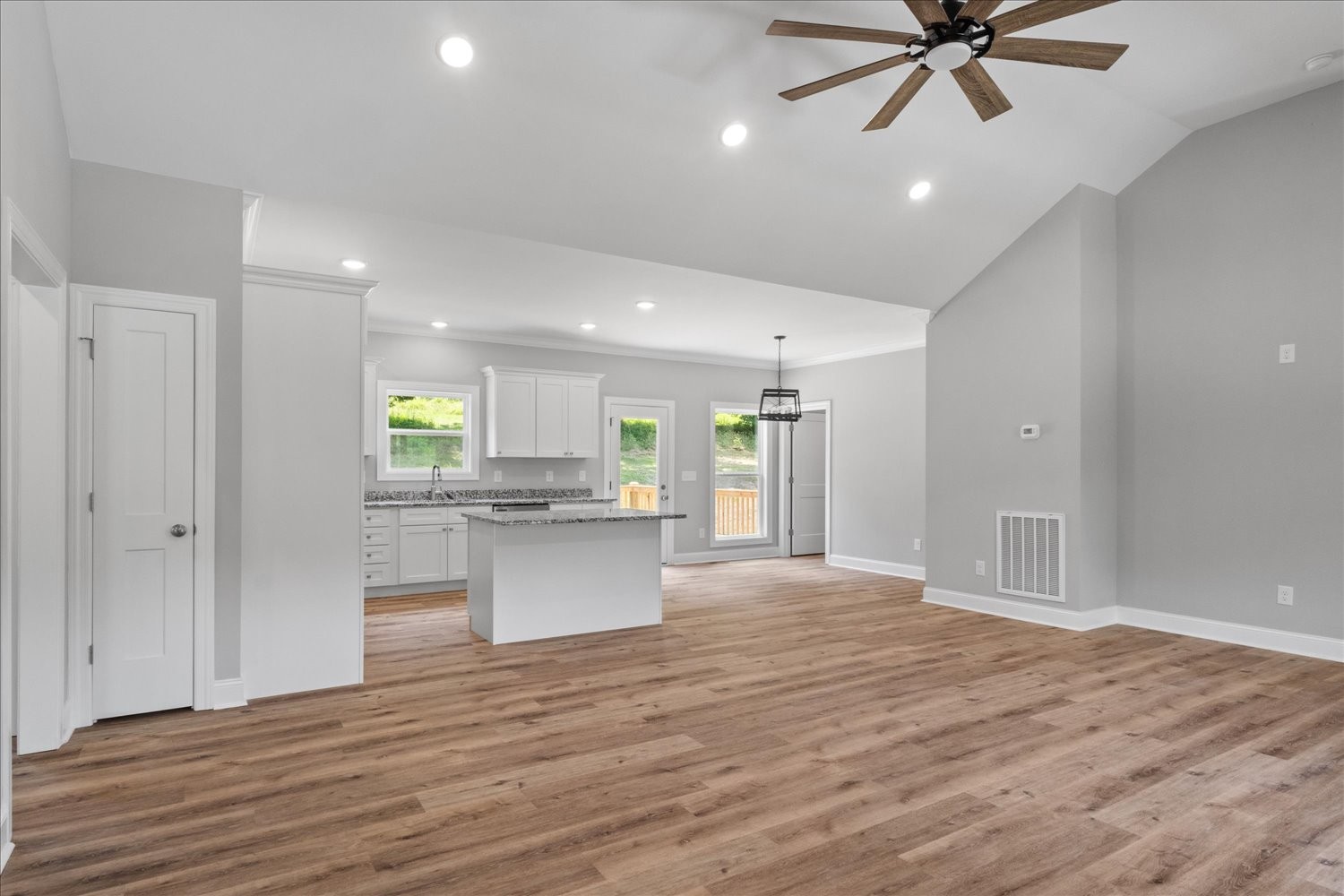 763 Potter Road Dickson, TN 37055 - Photo 4 of 23 a view of an empty room and kitchen with microwave oven