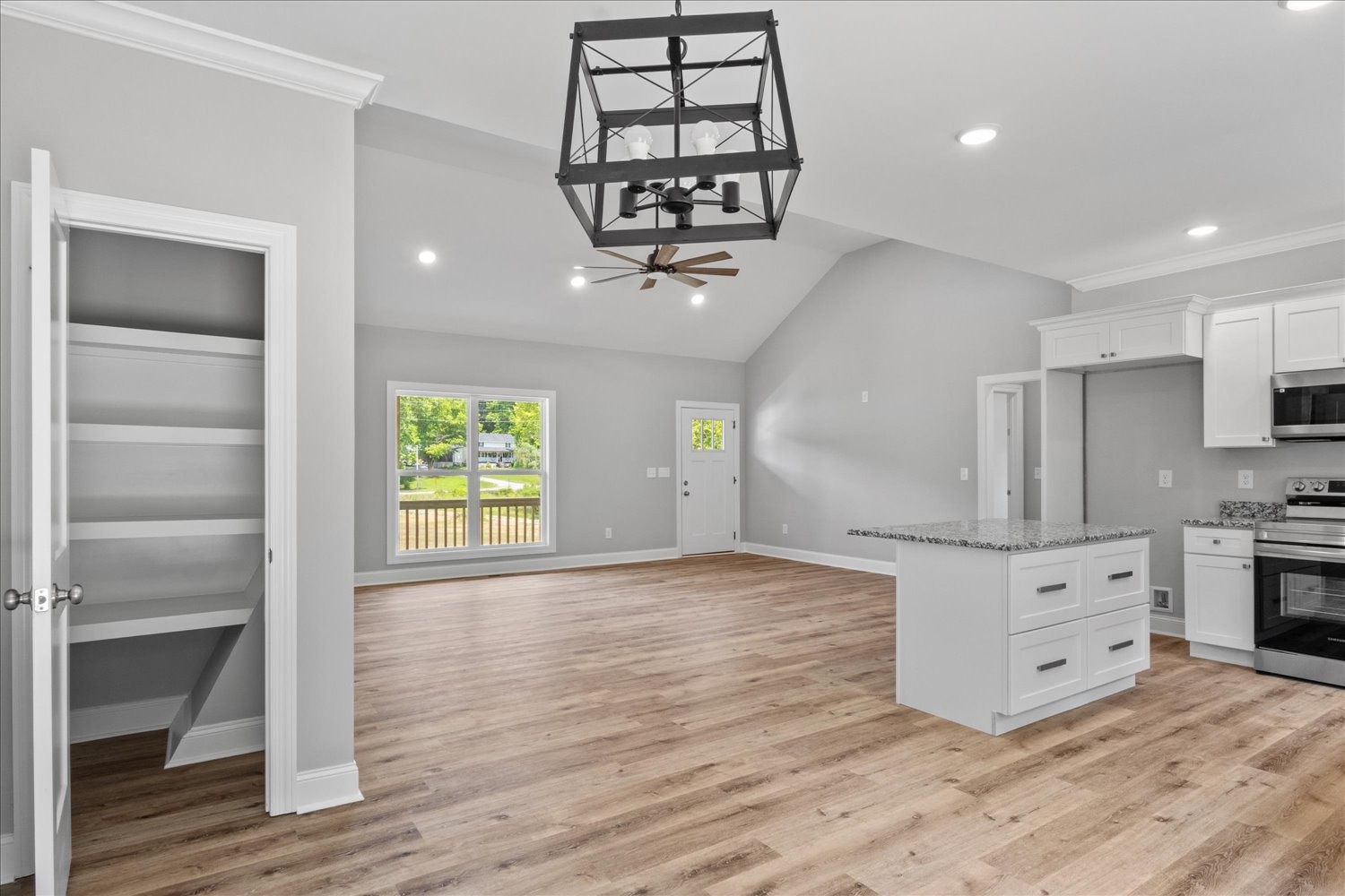 763 Potter Road Dickson, TN 37055 - Photo 5 of 23 a view of a kitchen with wooden floor and electronic appliances