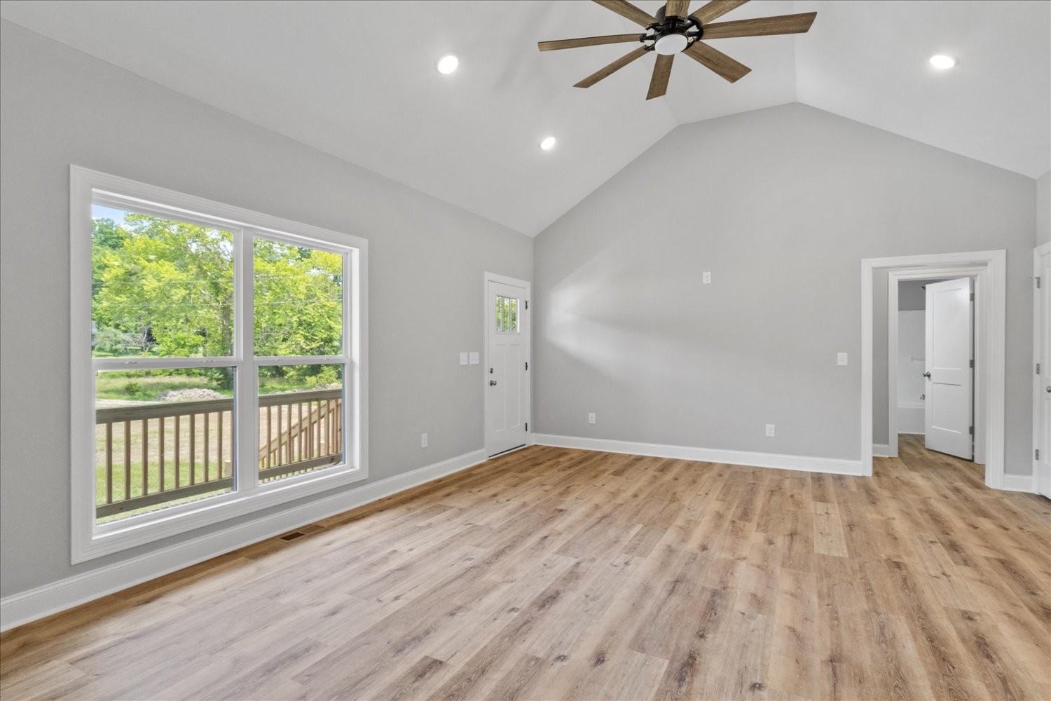 763 Potter Road Dickson, TN 37055 - Photo 6 of 23 a view of an empty room with wooden floor and a window