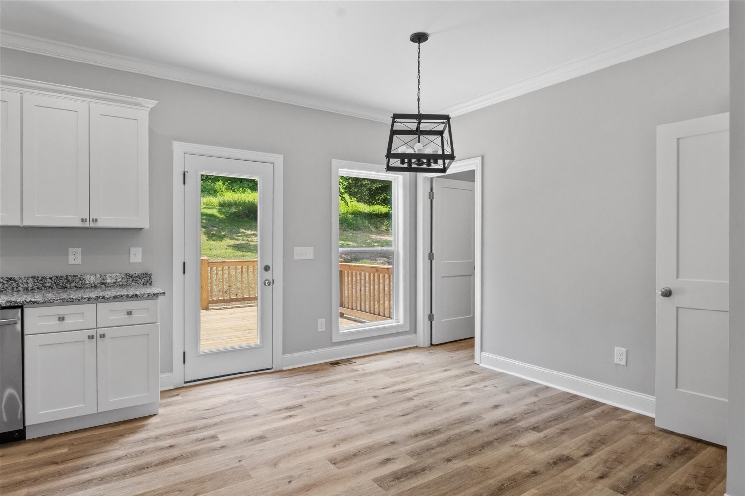 763 Potter Road Dickson, TN 37055 - Photo 9 of 23 a view of empty room with wooden floor and window